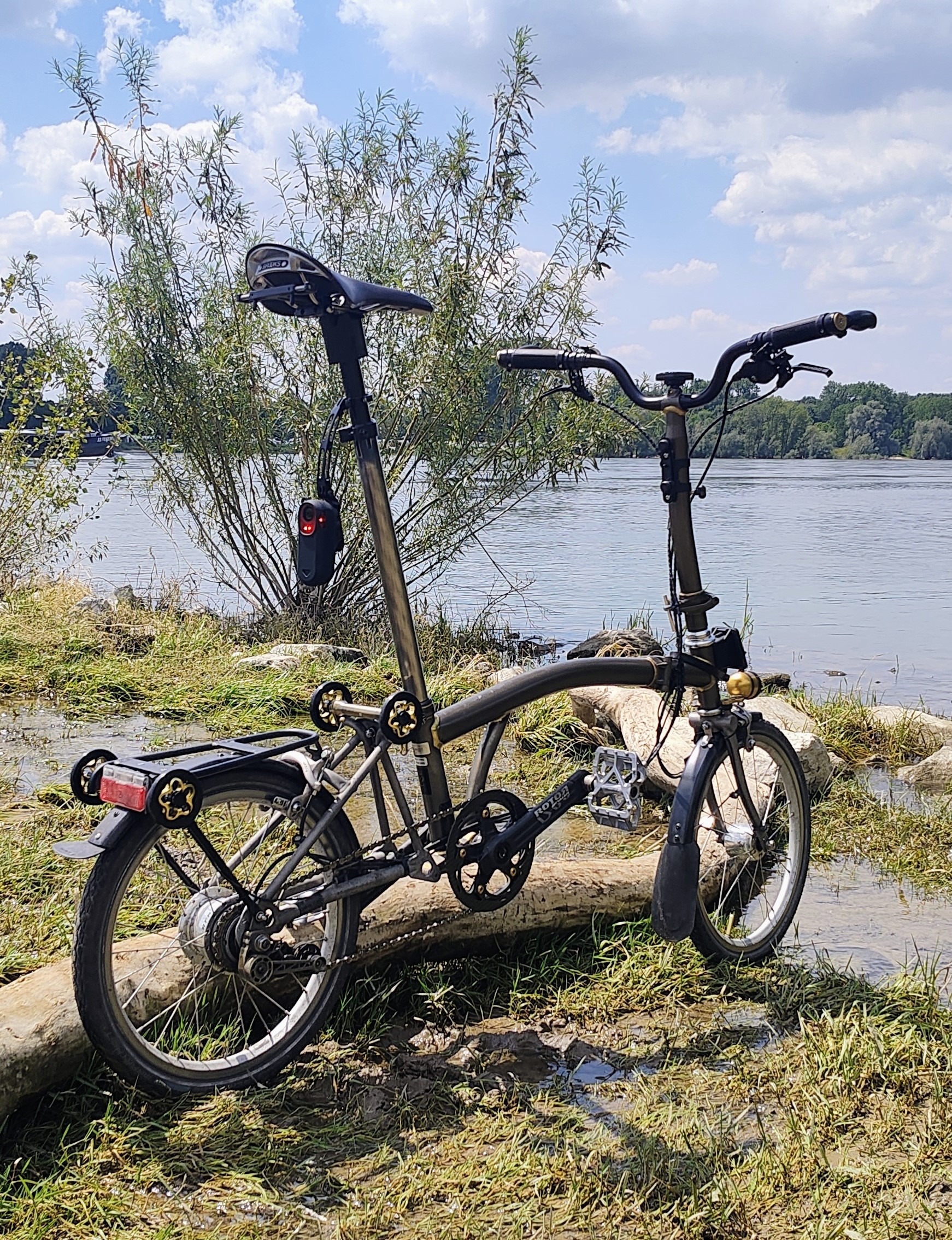 My Brompton folding bicycle on the banks of the river Rhine.